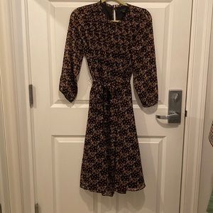 Black print midi almost ankle (I'm 5'2) Smocked top  with sheer sleeves.
